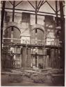 [Interior arches and columns, during Paris Opera construction]