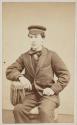 [Man wearing hat]