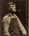 [Worker with goggles and a pipe, Empire State Building]