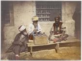 [Turkish public scribe with two onlookers]