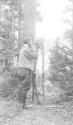 Frank Macomber shaving outdoors, Wyoming Trip