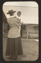 Oak Lodge guest holding African American baby, Oak Lodge Trip