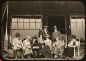 GE and guests on porch, Oak Lodge Trip