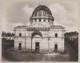 [Scaffolded Classical-style building]