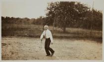 [Lewis Hine playing tennis]