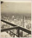 [Empire State Building under construction with New York City skyline]