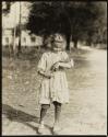 [Girl holding doll, Bluffton, South Carolina]