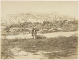 [Man posed in landscape]