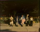 [Children in costumes with flags at Jones Park]