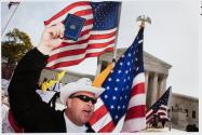 Washington, DC, A circus-like atmosphere was on display in front of the Supreme Court as demonstrators for and against President Obama's health-care law made their voices heard.