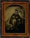 [Woman in Scottish clothes holding sword]