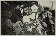 [Couple, dog, and snowman]