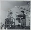 [People dancing in living room]