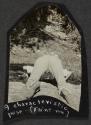 [Kneeling man seen from behind]