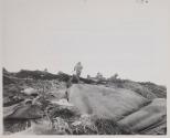U. S. Army troops advance in the face of enemy fire.