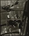 [Men working on mooring mast, Empire State Building]