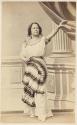 [Woman in theater costume]