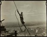 [Worker on cable, Empire State Building construction]