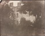 [Buildings with trees, garden and garden statue]