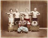 [Four Sumo wrestlers with referree]