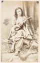 [Woman playing mandolin]