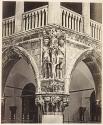 [Carved details atop column]