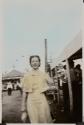 [Young woman at a fair]