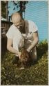 [Man and puppy]