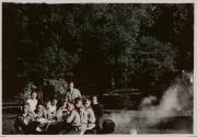 [Boyscouts seated at picnic table]