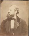 [Bearded man in profile]