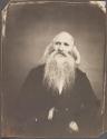 [Man with long hair and beard]