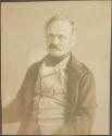 [Man wearing cravat]