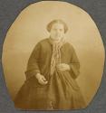 [Woman wearing scarf]