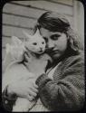[Young Woman Holding Cat]
