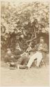 [Three men drinking wine]