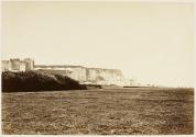 [Cliffs, beach and castle]