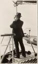 George Eastman with sextant on deck of yacht, Labrador Trip