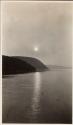 Sun through haze over river, Labrador Trip