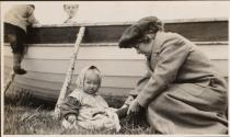 Mary Mulligan & children near boat, Labrador Trip