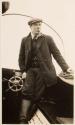 Man piloting boat, Labrador Trip