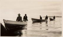Camping companions in boats tied together, Labrador Trip