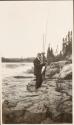 Fishing companions on riverbank, Labrador Trip