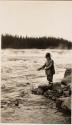 Man fishing in river, Labrador Trip