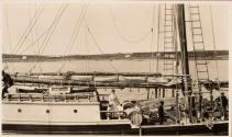 Woman & children on deck of boat, Labrador Trip