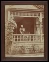 Maria Eastman on porch of Arnold Park house