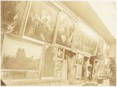 [Gallery with paintings and two statues]