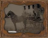 [Man and girl sitting in horse-drawn carriage]