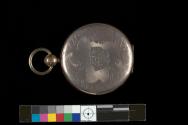 [Gold locket with four hinged family daguerreotypes]