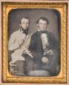 [Two men with cigars]