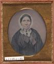 [Elderly woman wearing bonnet]